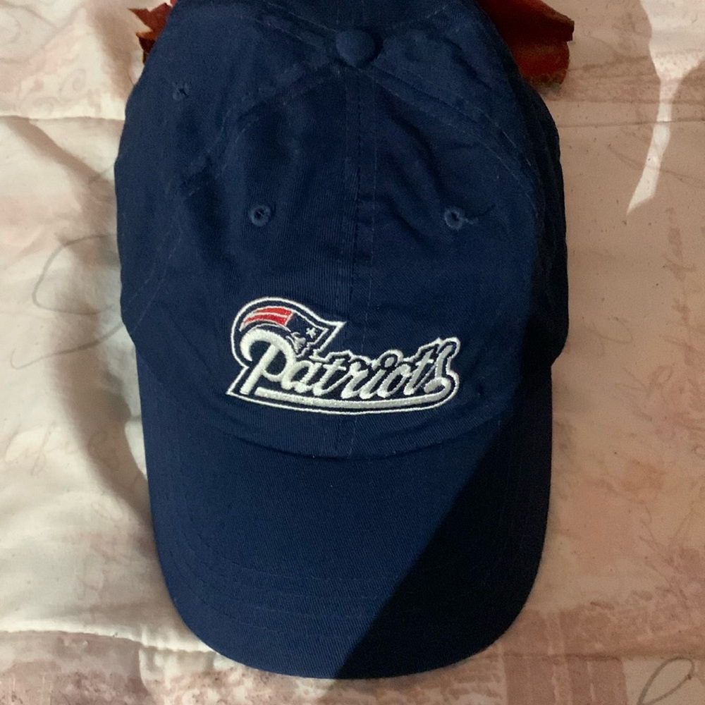 Vintage Patriots baseball cap with mask in the back.